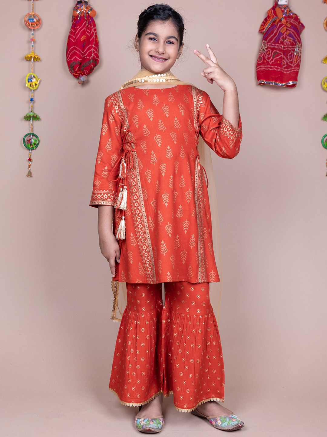 

HERE&NOW Girls Rust Floral Printed A-Line Kurta with Sharara & Dupatta