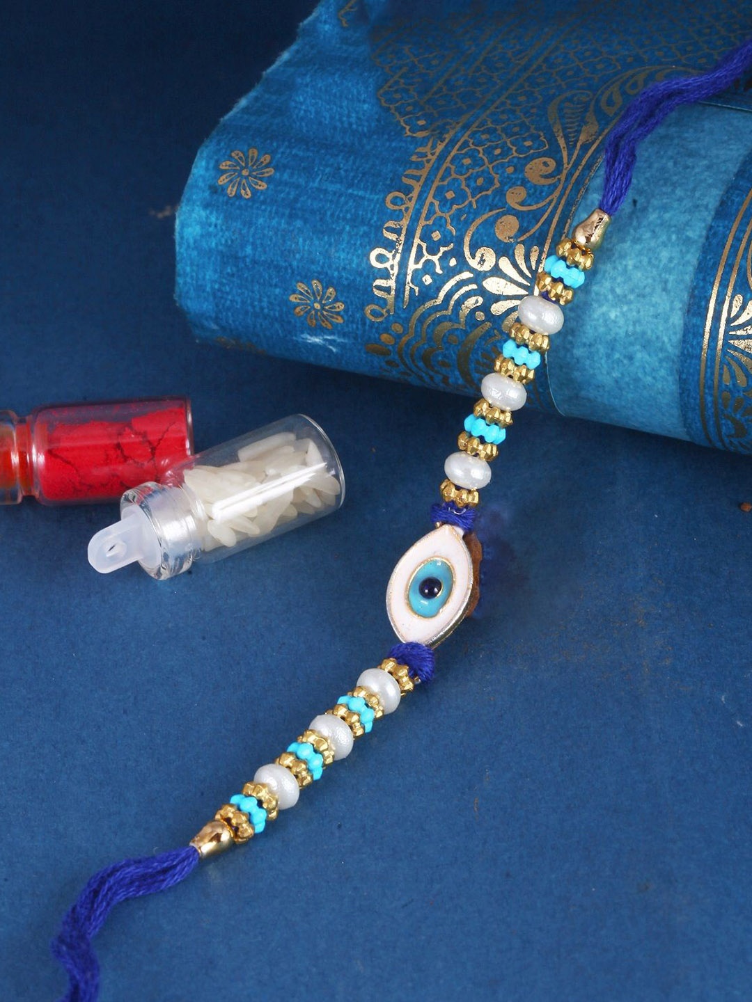 

Vighnaharta Set of 4 Pearls Beaded Thread Rakhis, Red