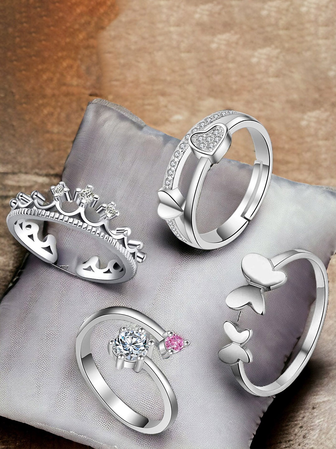 

Okos Set Of 4 Rhodium-Plated Cubic Zirconia Studded Alluring Valentino Finger Rings, Silver
