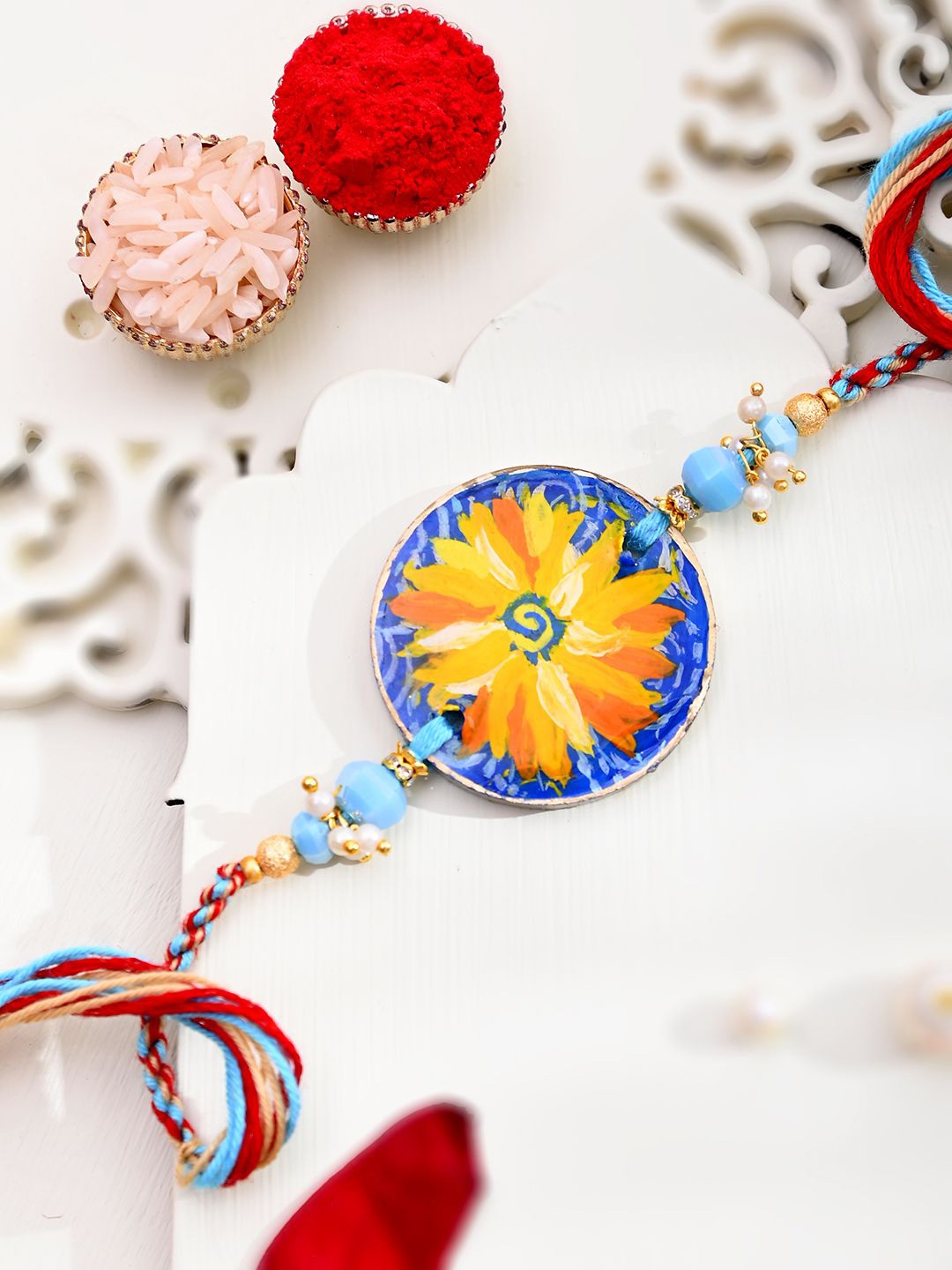 

Aapno Rajasthan Printed Rakhi With Roli Chawal & Greeting Card, Yellow