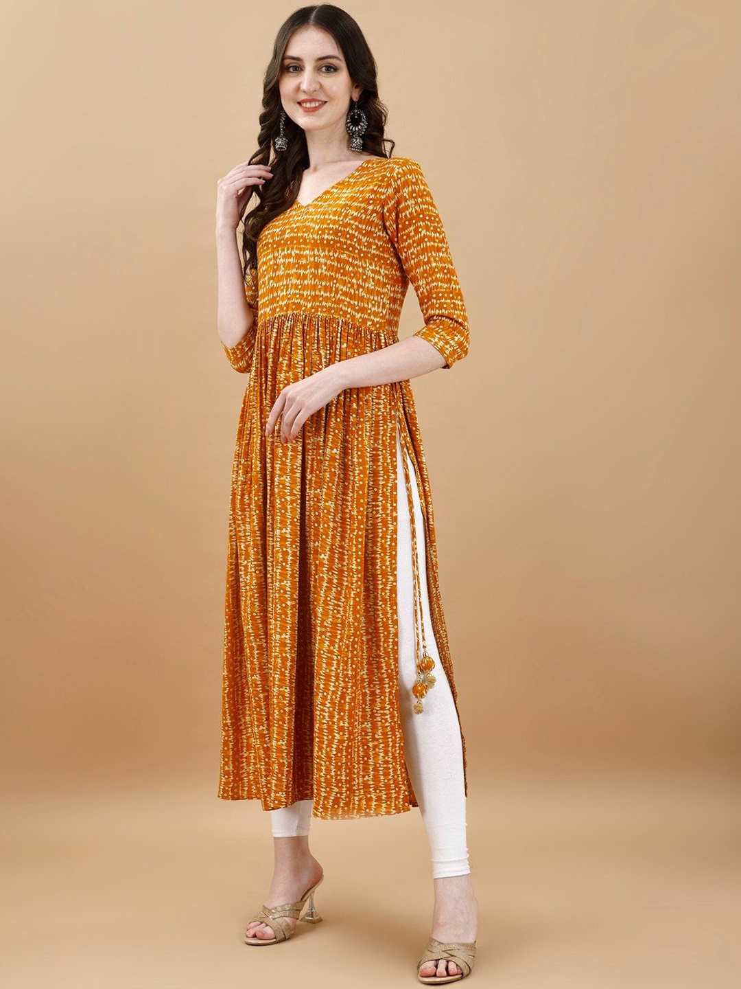 

TextileNow Women Geometric Striped Flared Sleeves Gotta Patti Kurta, Yellow