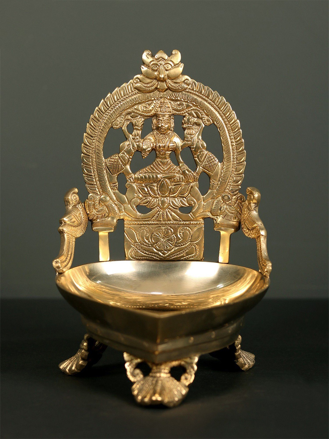 

Exotic India 8" Brass Goddess Gajalakshmi Oil Lamp, Gold