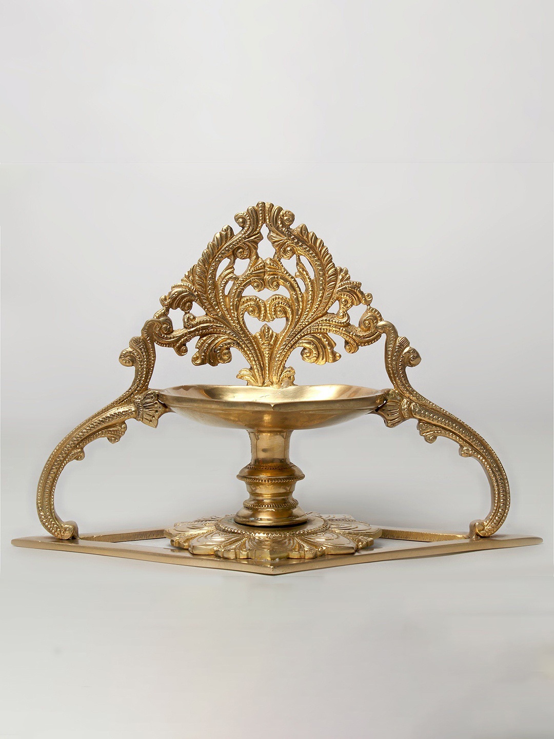 

Exotic India 10" Designer Brass Lamp (Diya) with Stand, Gold