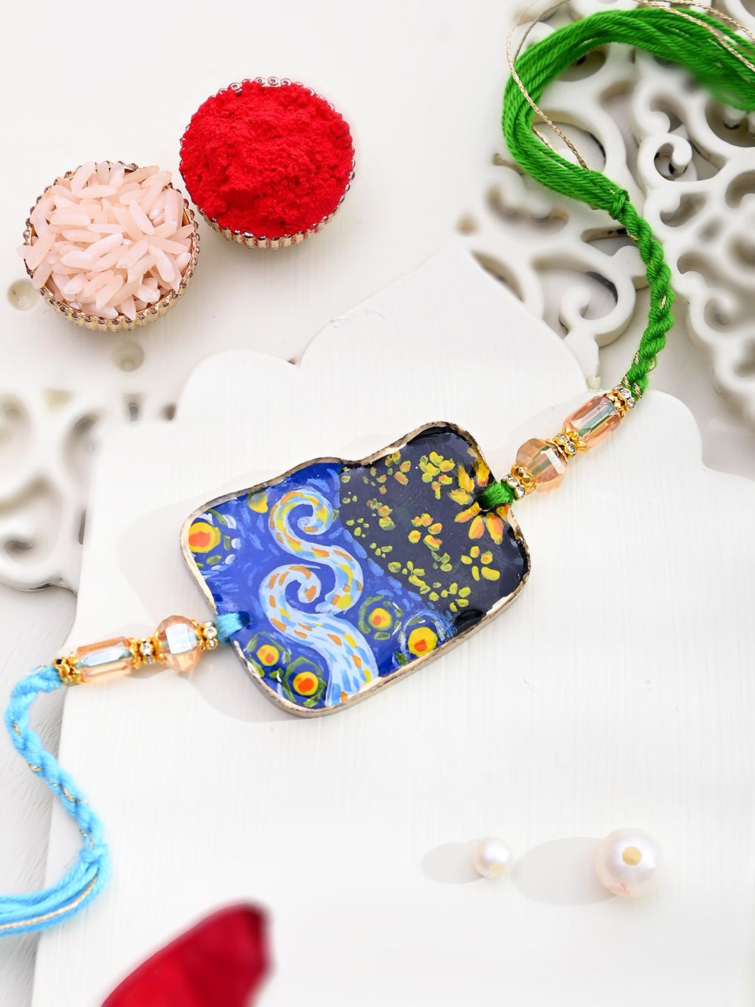 

Aapno Rajasthan Rakhi With Roli Chawal & Greeting Card, Black