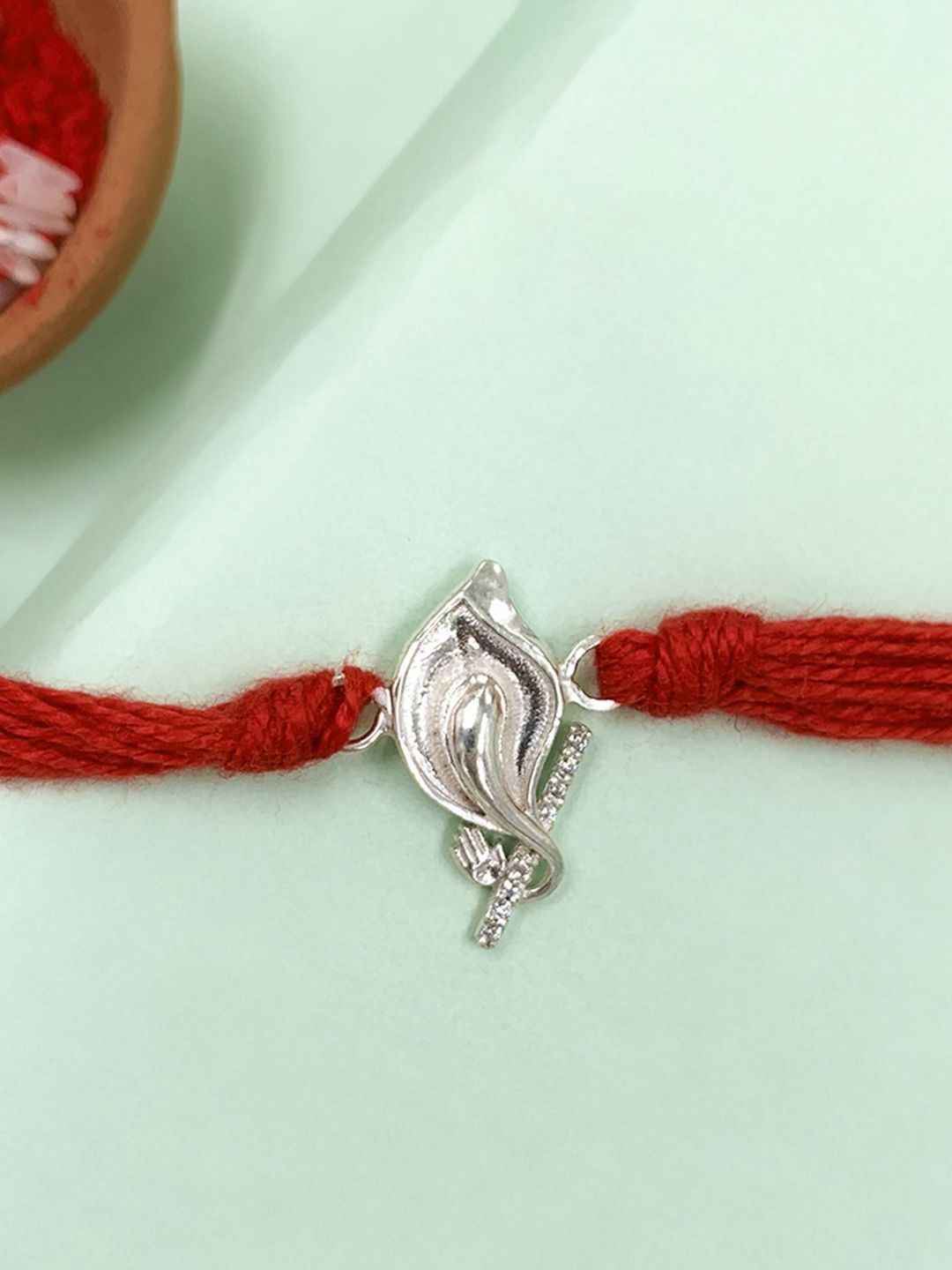 

Unniyarcha Pure 92.5 Flute Ganesha Thread Rakhi, Silver