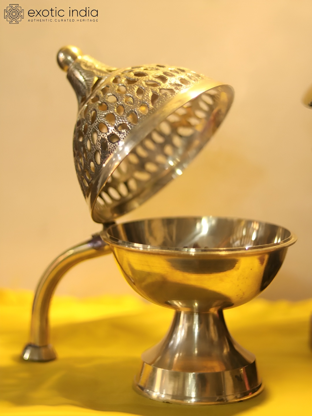 

Exotic India Gold Toned Brass Dhoop Dani
