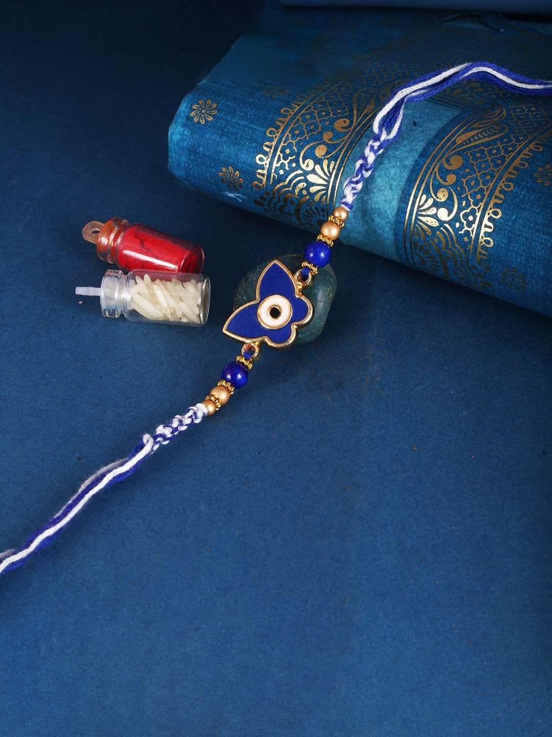 

Vighnaharta Thread Rakhi, Red