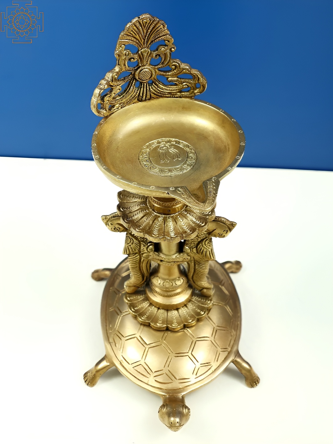 

Exotic India 10" Brass Oil Lamp Stand on Tortoise, Gold