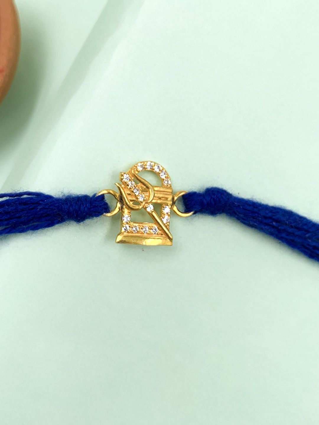 

Unniyarcha Thread Rakhi, Gold