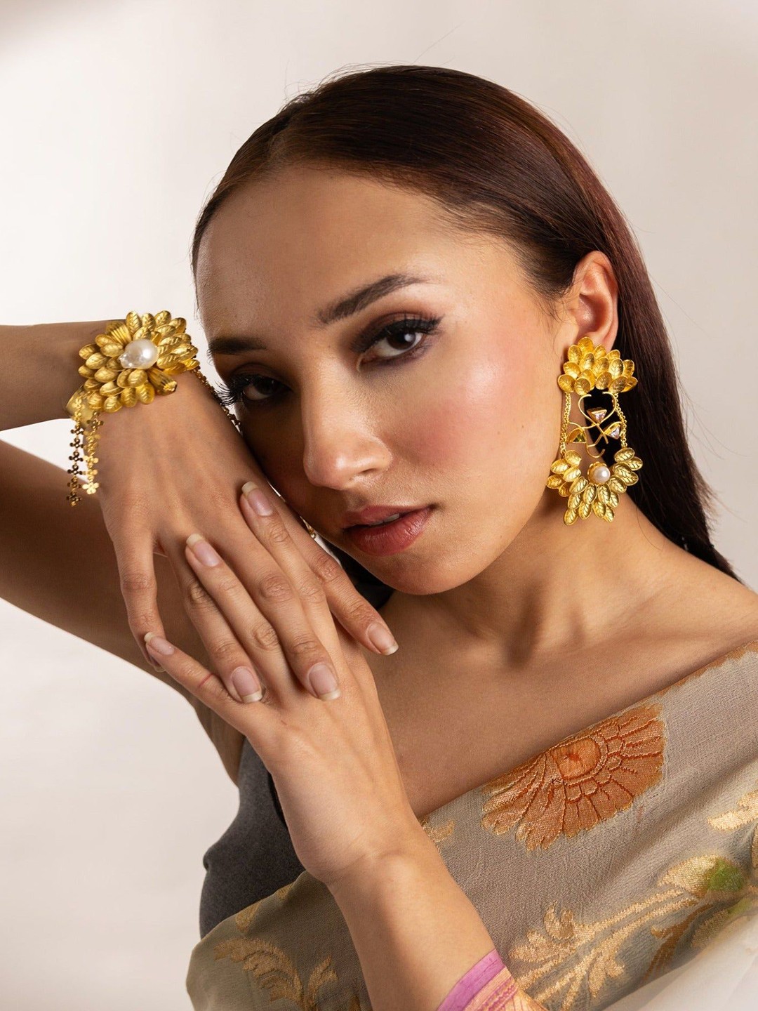 

Trupti Mohta Women Brass Pearls Gold-Plated Cuff Bracelet