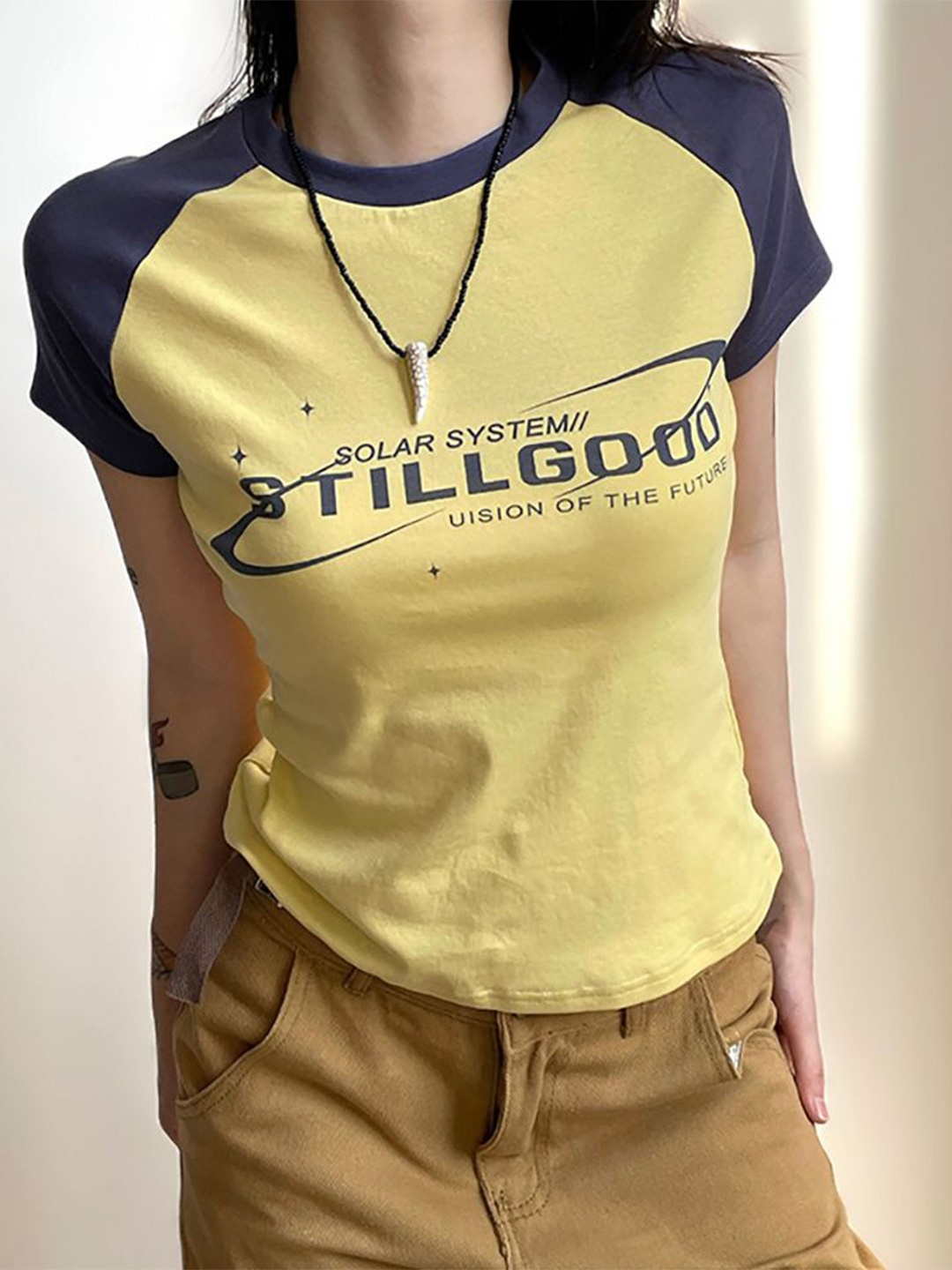 

StyleCast x Revolte Women Typography Printed Round Neck Top, Yellow