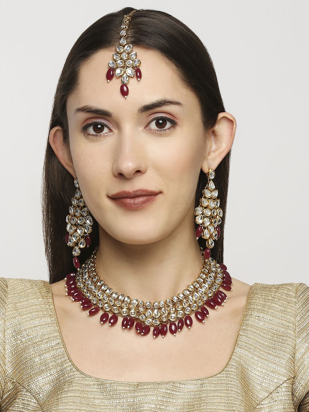 

Anouk Gold Toned Kundan Studded & Beaded Jewellery Set