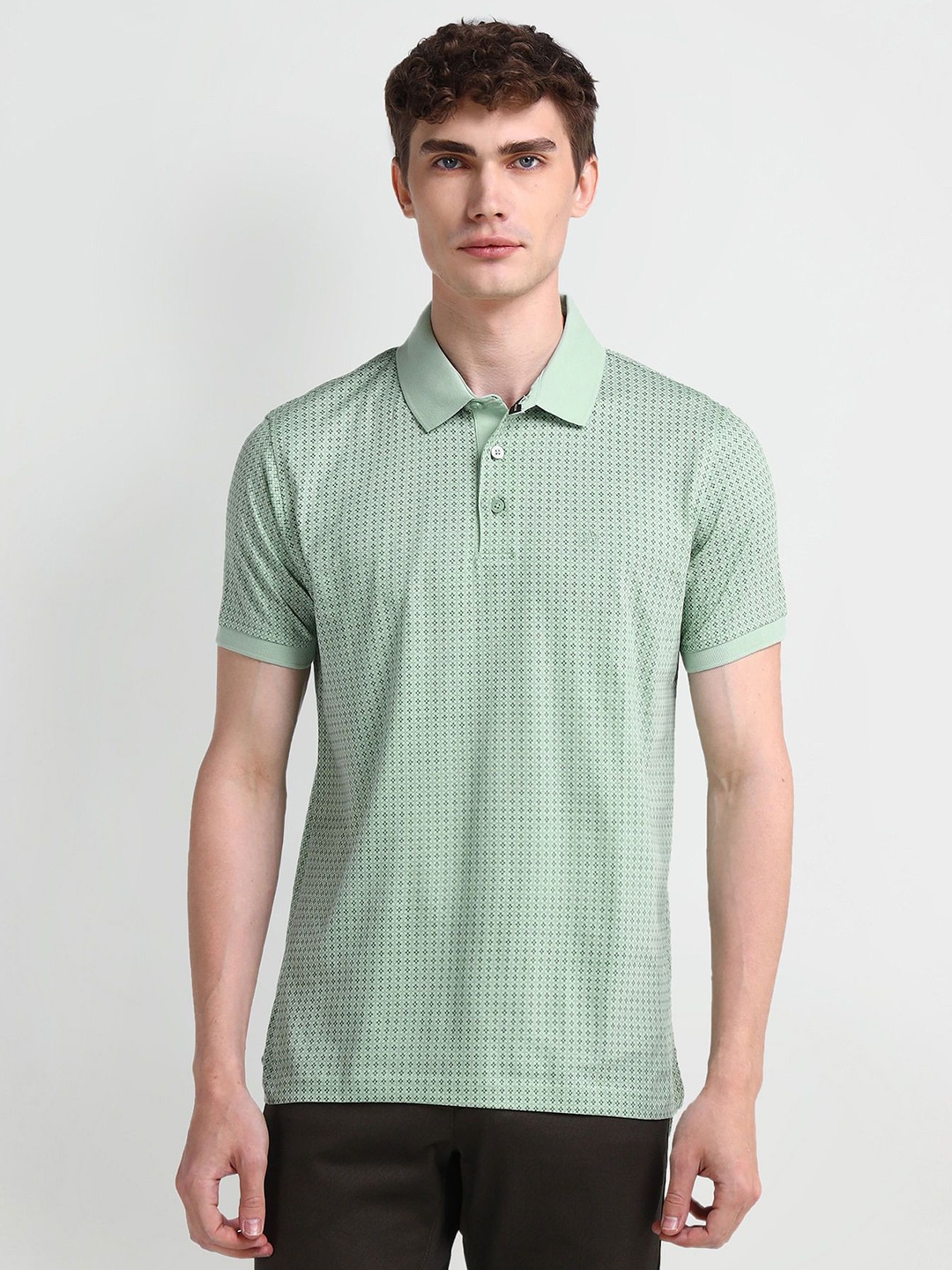 

Arrow Men Geometric Printed Polo Collar Cotton T-shirt, Green