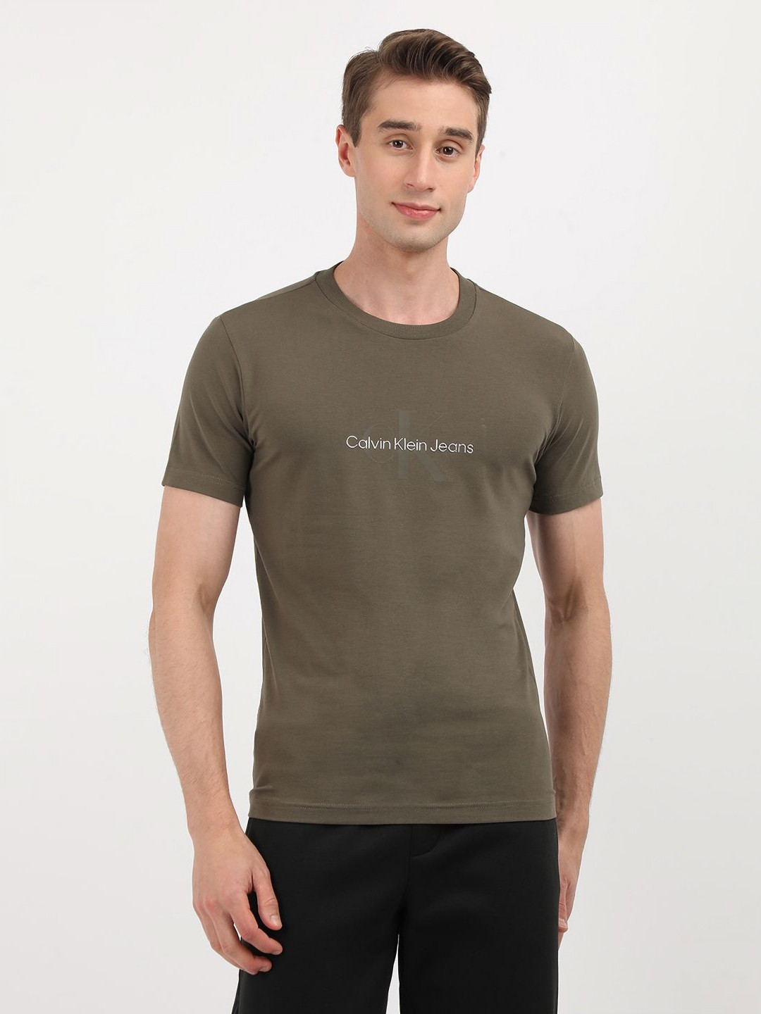 

Calvin Klein Jeans Men Typography Printed Round Neck Cotton Slim Fit T-shirt, Brown