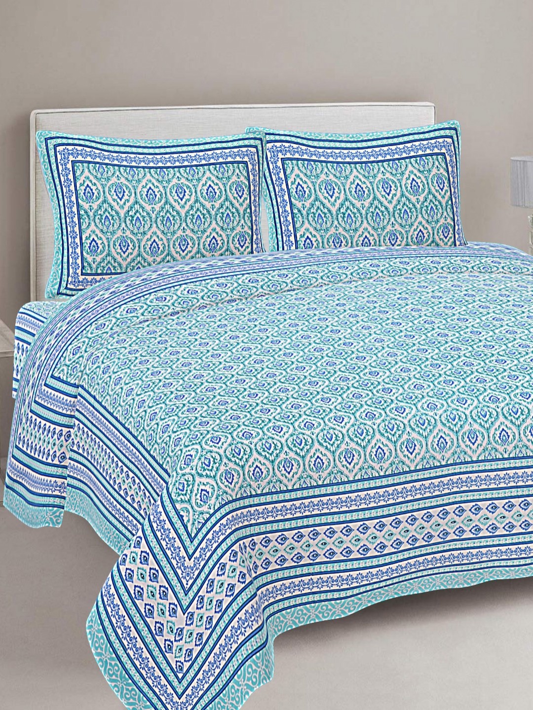 

FrionKandy Living Turquoise Blue Printed Cotton 180 TC King Bedsheet With 2 Pillow Covers