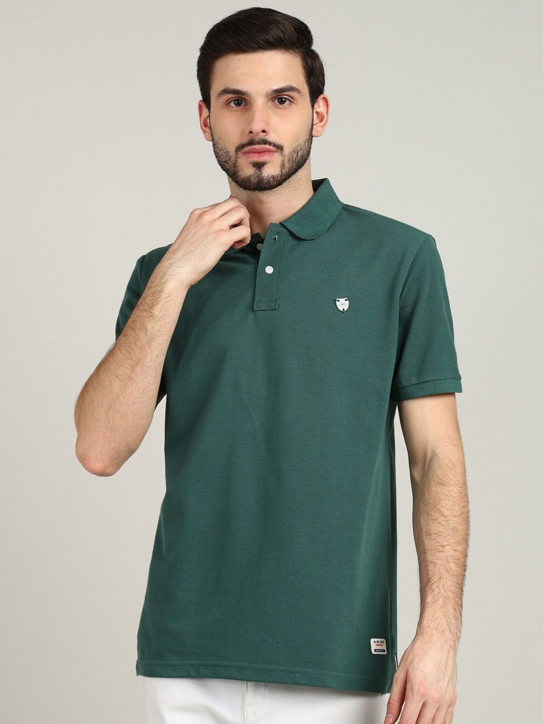 

Alan Jones Men Solid Polo Collar Cotton Slim Fit T-shirt, Green