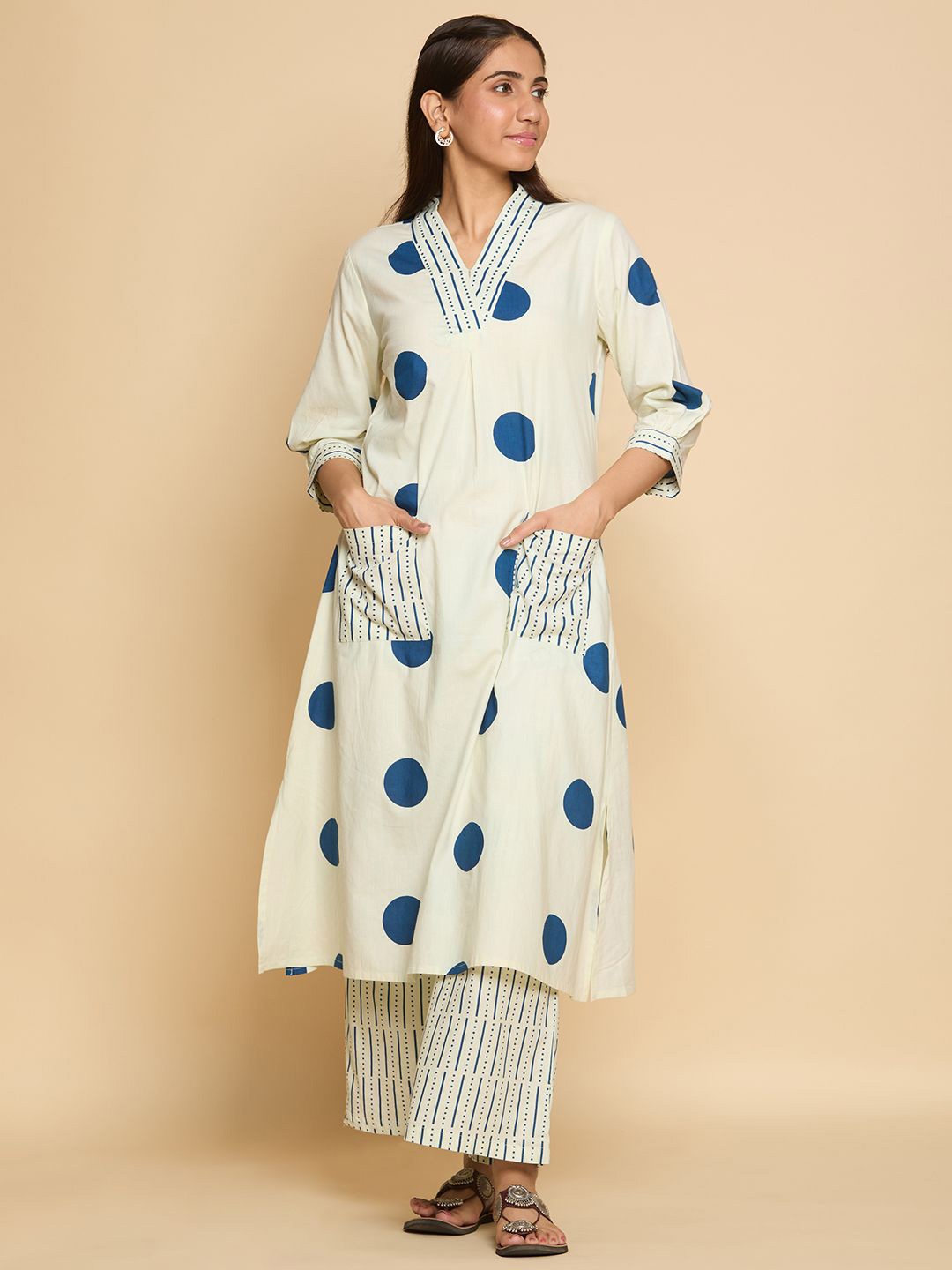 

Chandbaali Geometric Printed V-Neck Pure Cotton A-Line Kurta with Palazzos, Cream