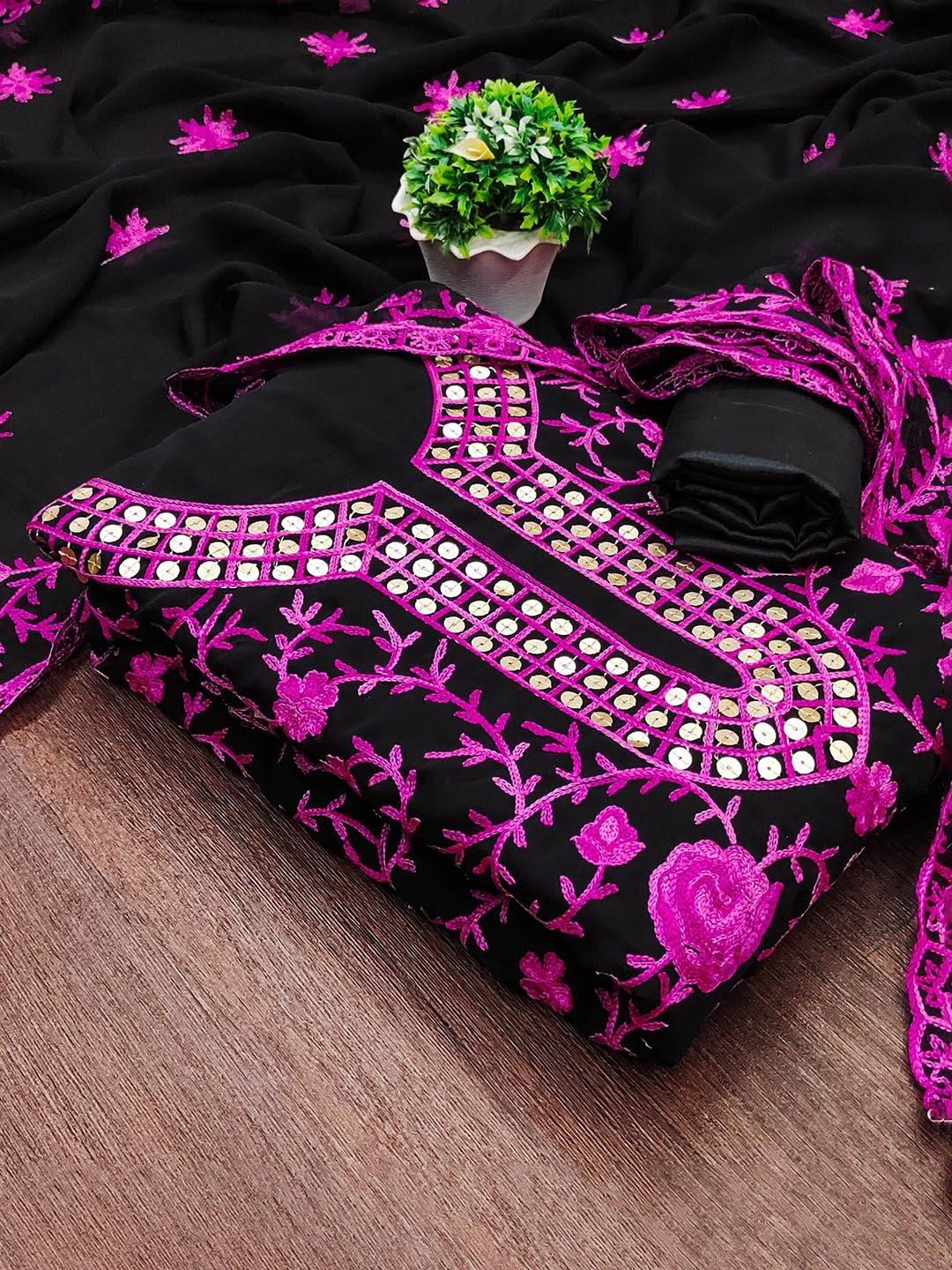 

Maroosh Floral Embroidered Sequinned Unstitched Dress Material, Magenta