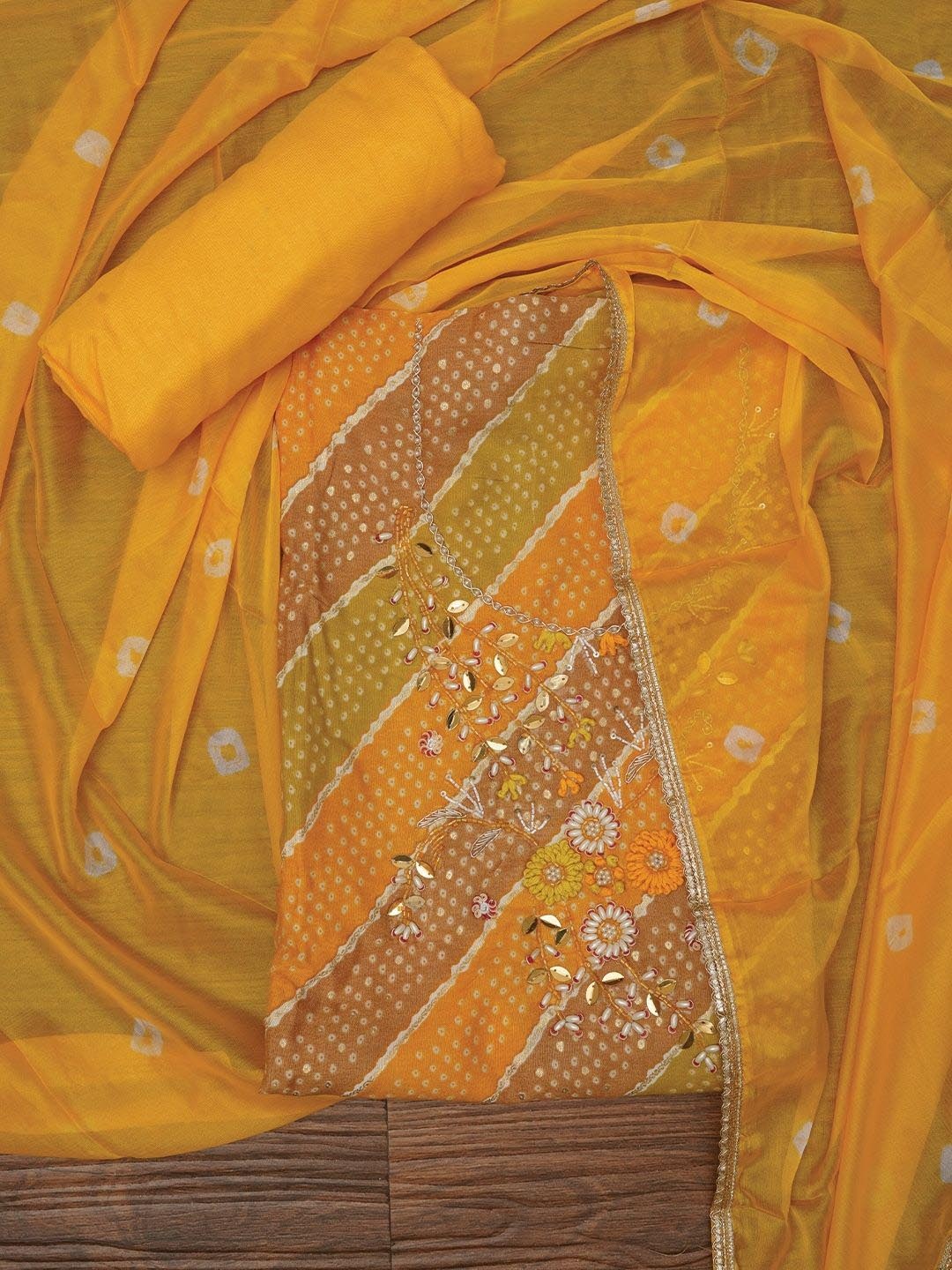 

Jaipur Kurti Yellow Unstitched Cotton Bandhani Printed Dress Material With Dupatta