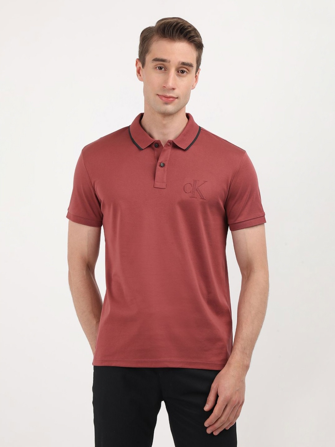 

Calvin Klein Jeans Men Solid Polo Collar Cotton T-shirt, Rust