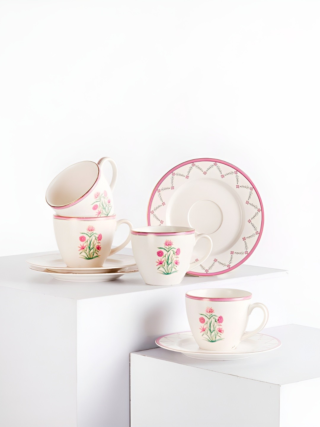 

Fabindia adwaya White and Pink 8 Pieces Printed Ceramic Glossy Cups & Saucers 180 ml