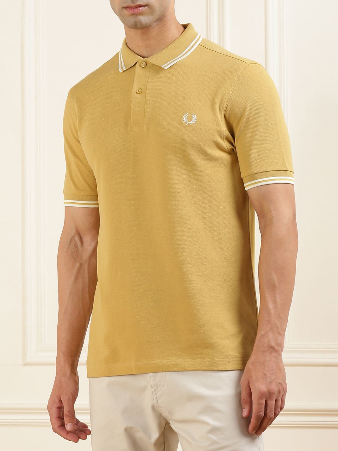 

Fred Perry Men Solid Polo Collar Cotton Slim Fit T-shirt, Yellow