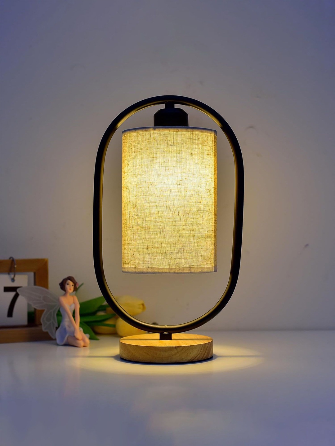 

Ekhasa White Textured Wooded Contemporary Cylindrical Shaped Table Lamp