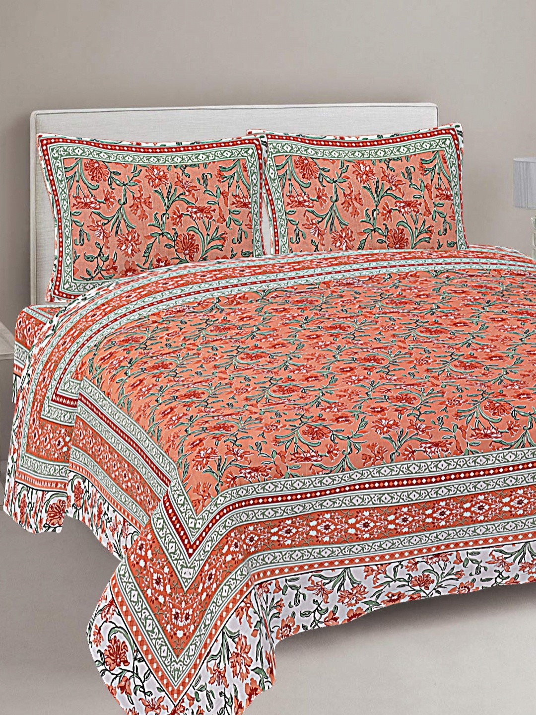 

FrionKandy Living Peach Floral Printed Cotton 180 TC King Bedsheet With 2 Pillow Covers