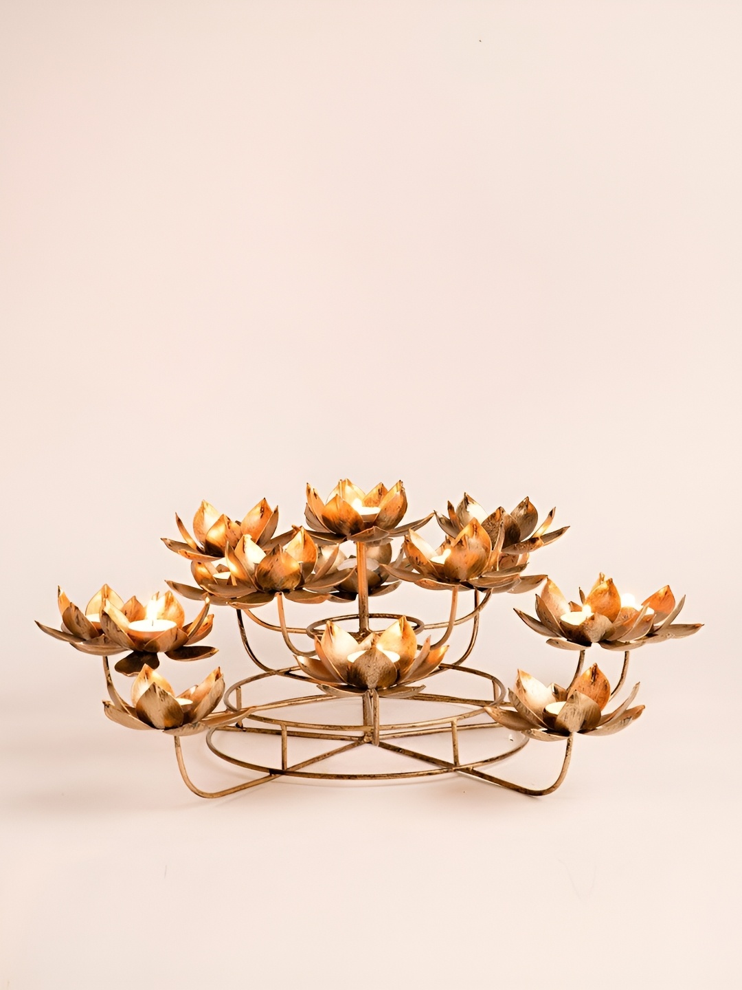 

Fabindia Gold-Toned MetalCandle Holder