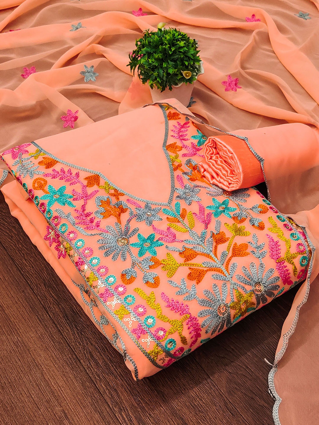 

Maroosh Floral Embroidered Sequinned Unstitched Dress Material, Peach