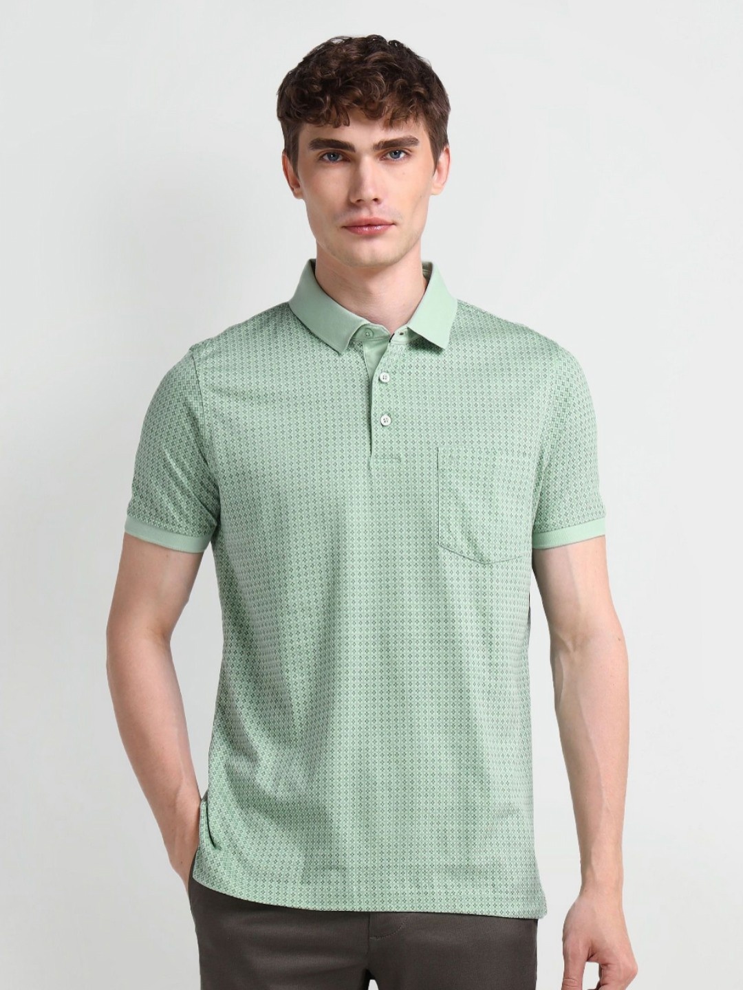 

Arrow Men Geometric Printed Polo Collar Cotton T-shirt, Green