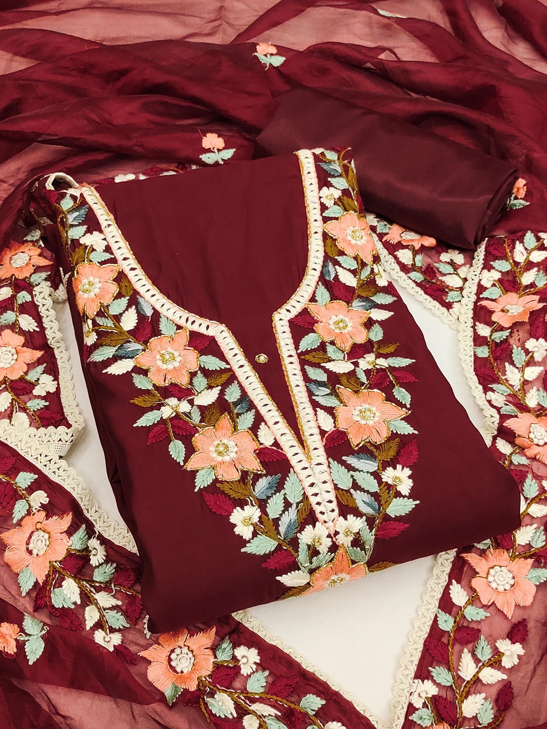 

Maroosh Floral Embroidered Unstitched Dress Material, Maroon