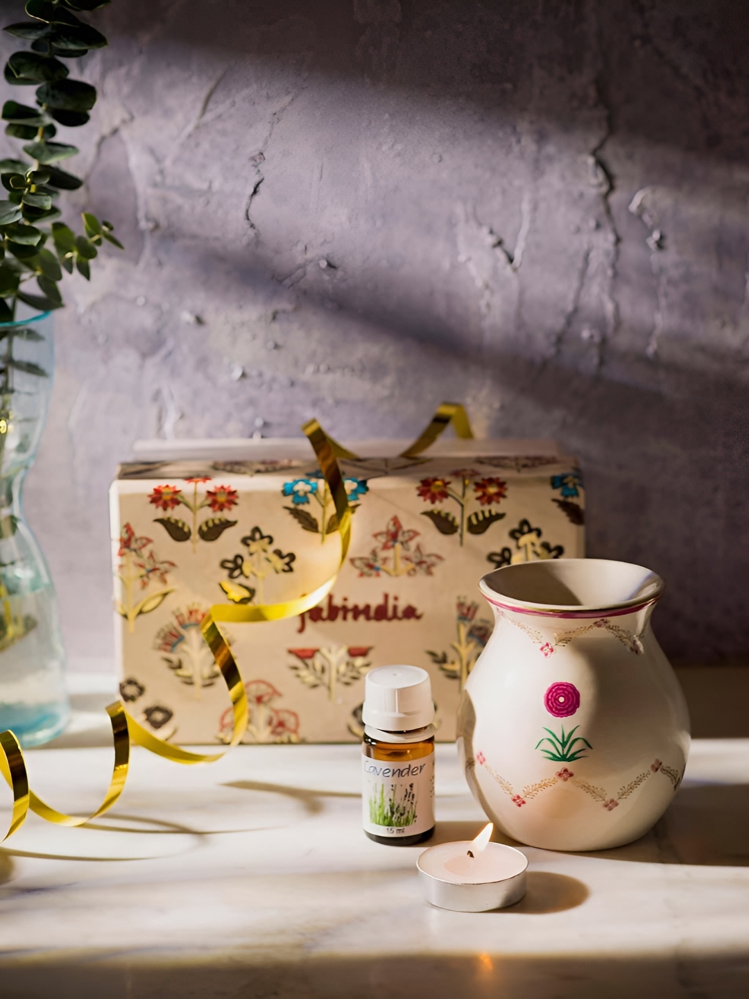 

Fabindia Cream Color 4 Pieces Printed Ceramic Aroma Oil Diffusers, Gold
