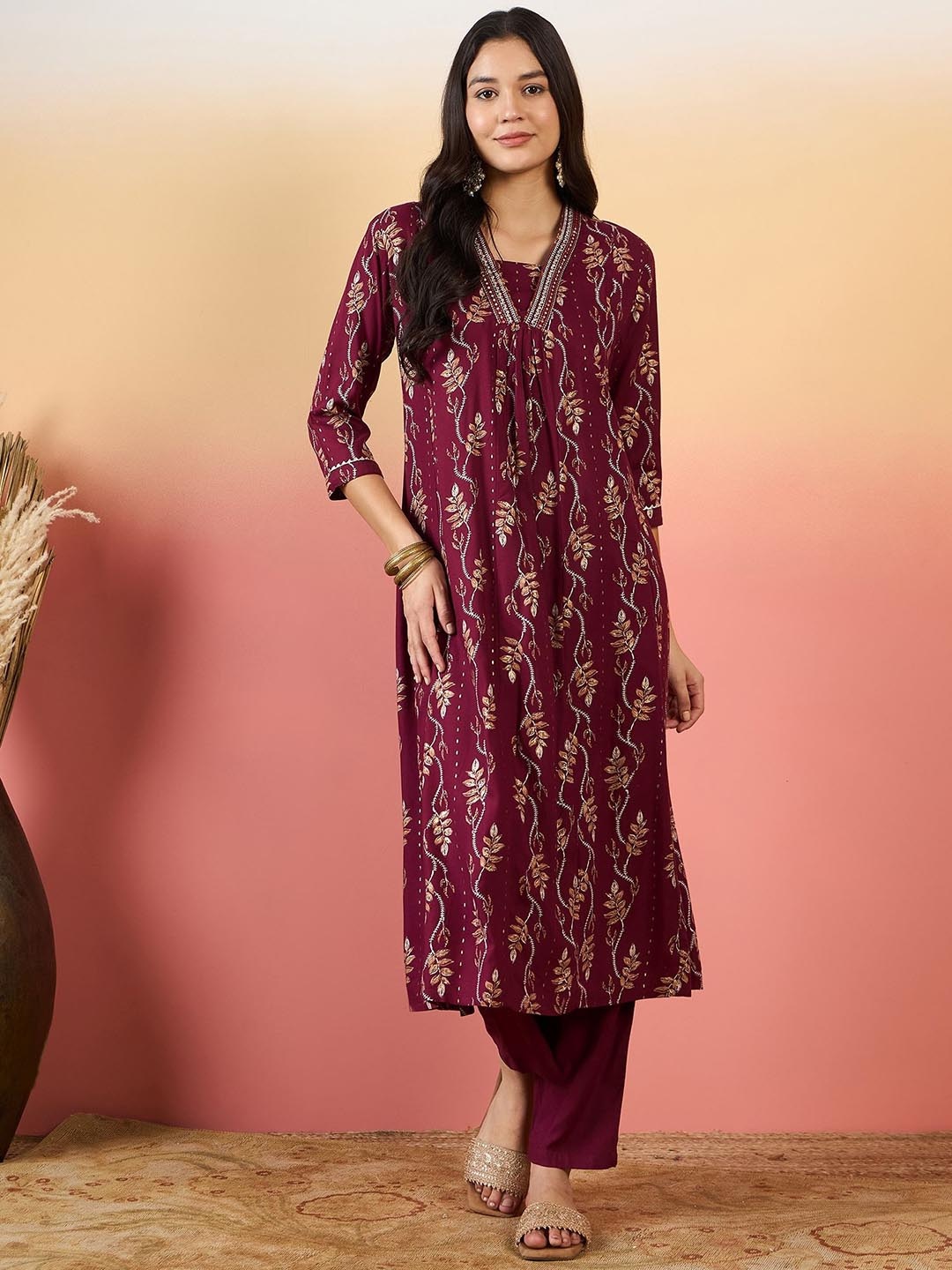 

KALINI Floral Printed V neck Thread Work A-Line Kurta With Palazzos, Purple