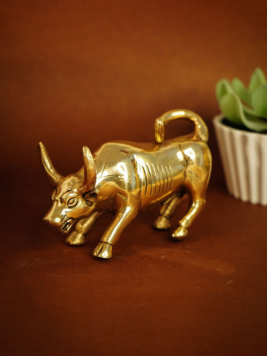 

Ekhasa Gold-Toned Brass Bull Figurine Showpiece