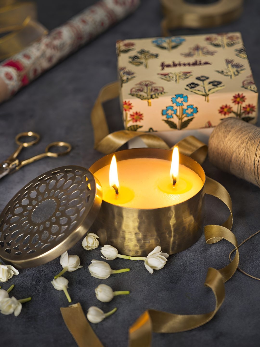 

Fabindia Gold Toned Jasmine Scented Metal Candle