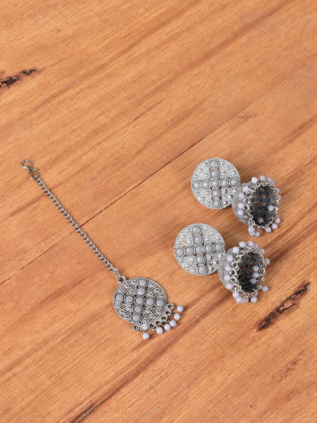 

Keviv Silver Plated Artificial Stones and Beads Dome Shaped Jhumkas with Mang Tika
