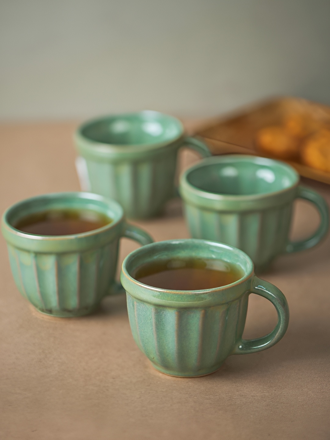 

Fabindia Green 4 Pieces Textured Ceramic Glossy Cups