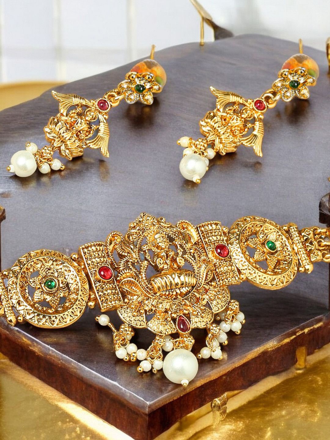 

Anouk Gold Toned Stone Studded & Beaded Temple Jewellery Set