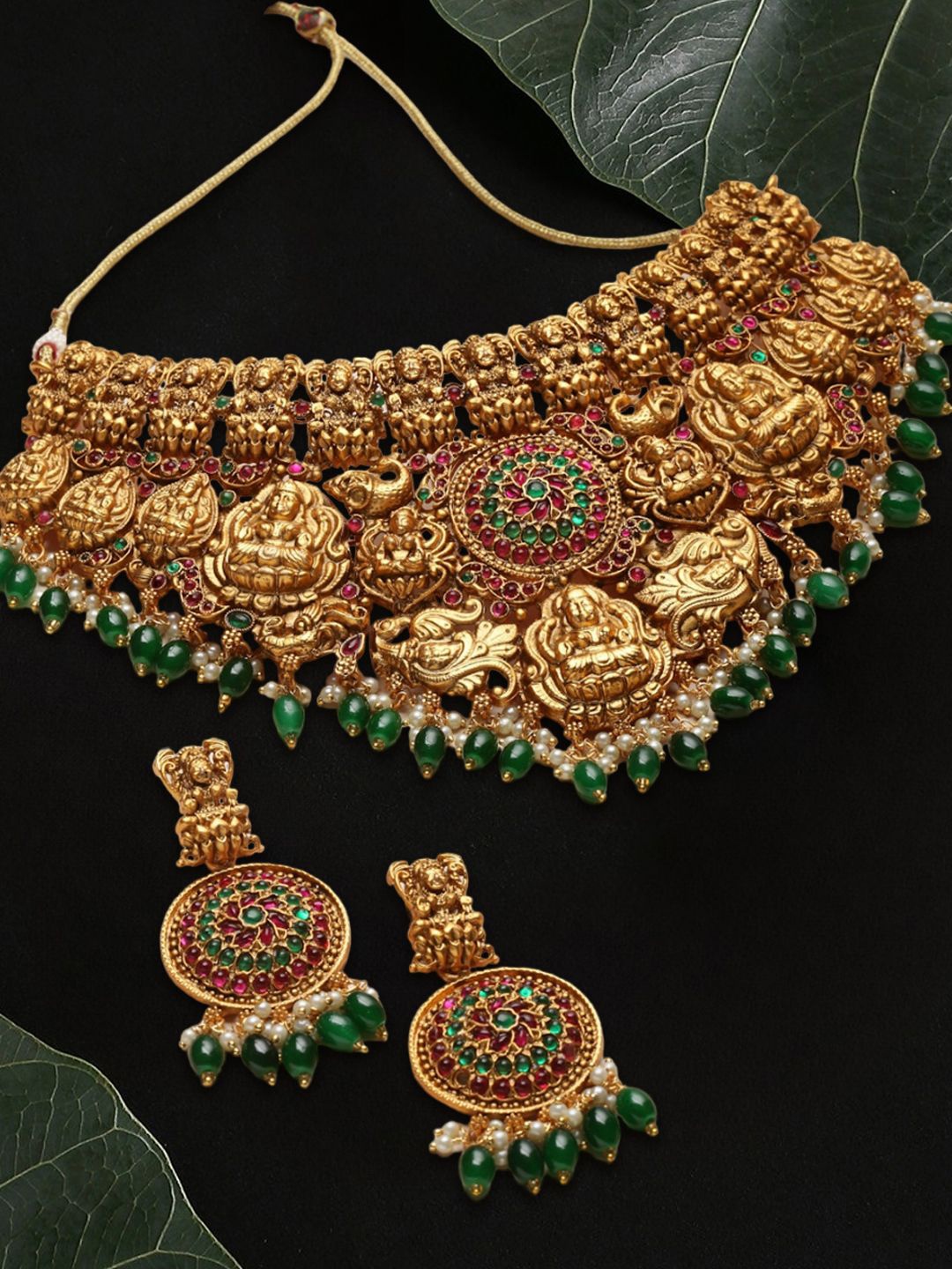 

Anouk Gold Toned Stone Studded & Beaded Temple Jewellery Set
