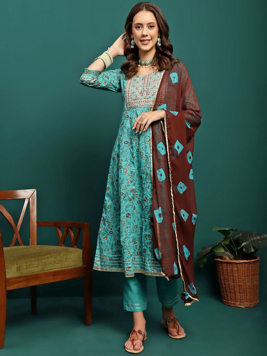 

Sangria Floral Printed Embroidered Thread Work Anarkali Kurta With Trousers & Dupatta, Turquoise blue