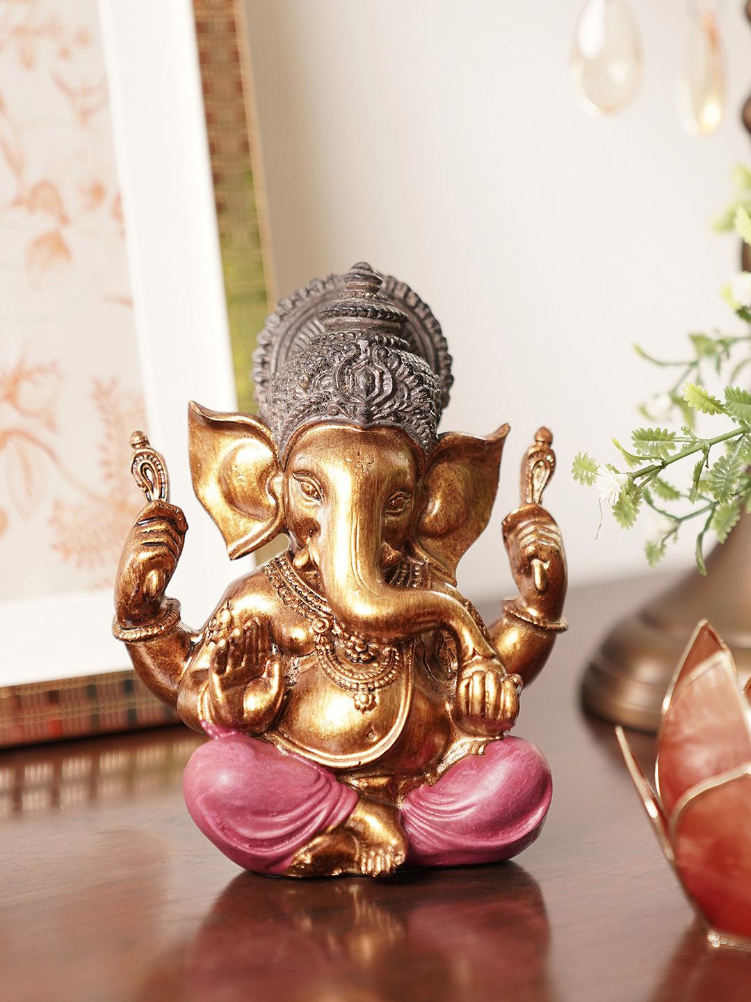 

Pure Home and Living Brown & Pink Lord Ganesha Idol Showpiece