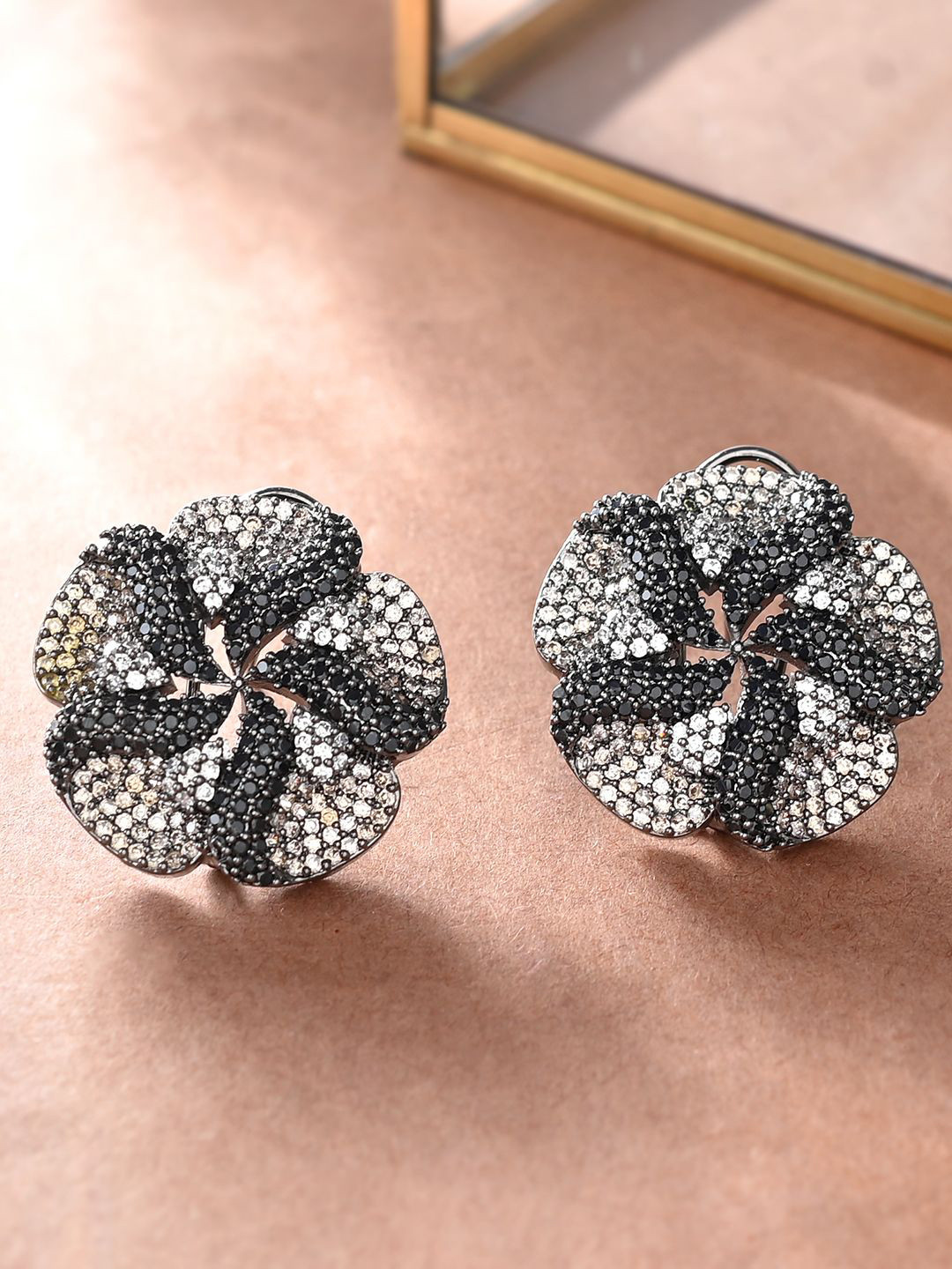 

Voylla Rhodium-Plated American Diamond Studded Floral Shaped Studs Earrings, Silver