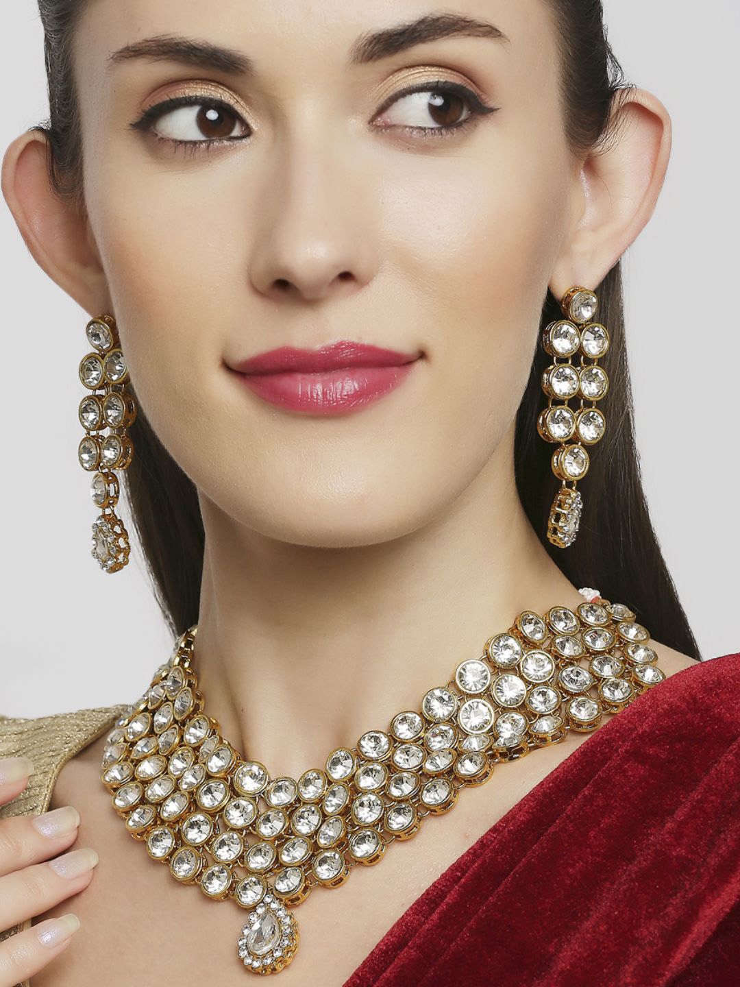 

Anouk Gold Toned Kundan Stone Studded Jewellery Set