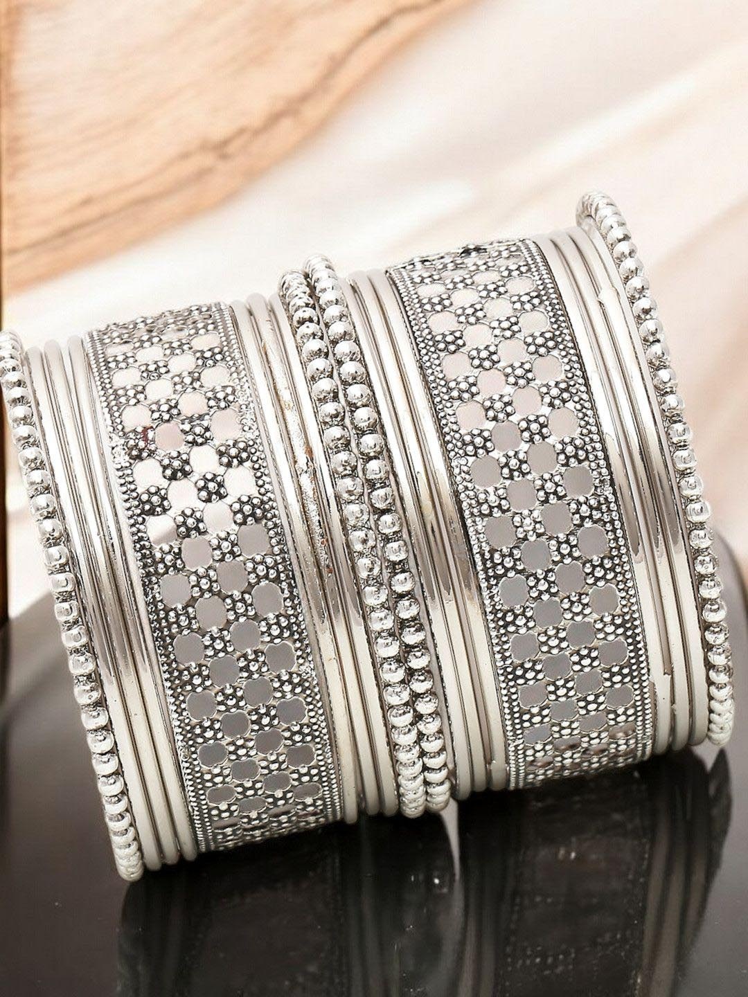 

Sangria Set Of 18 Floral Oxidised Bangles, Silver
