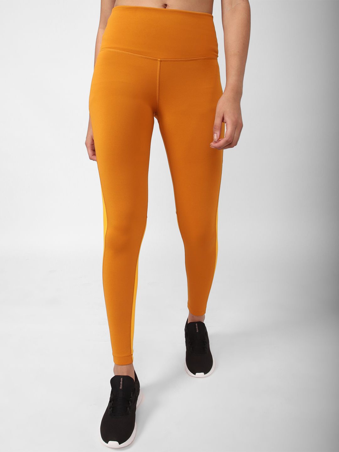 

Reebok Women Training Beyond The Sweat Leggings, Orange
