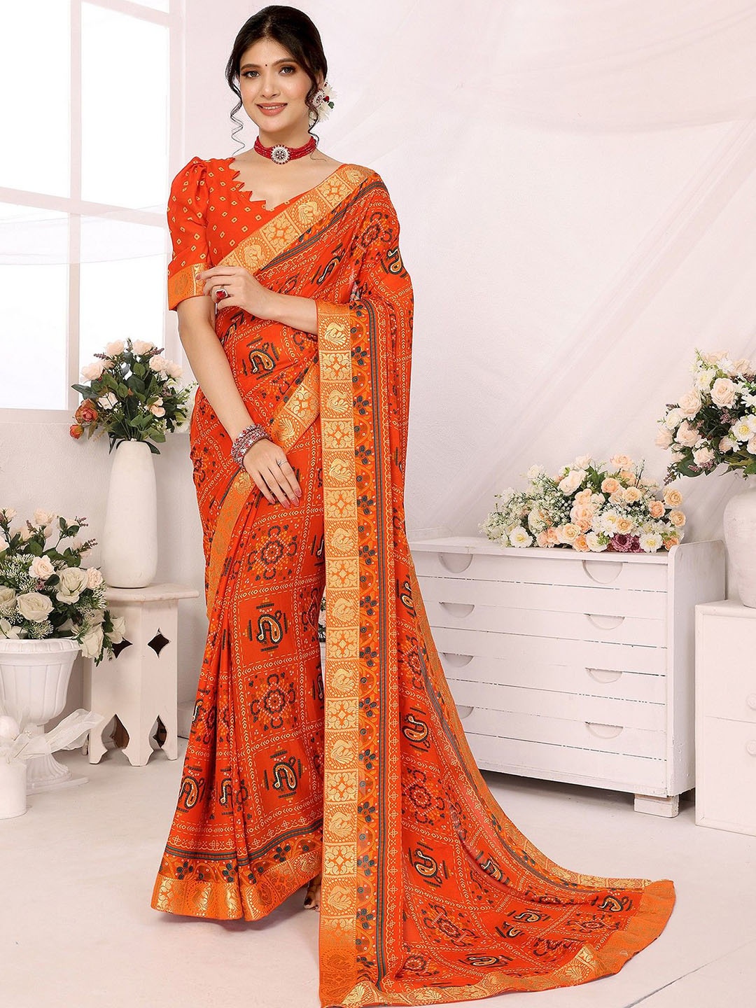 

KALINI Abstract Printed Zari Saree With Zari Border, Orange