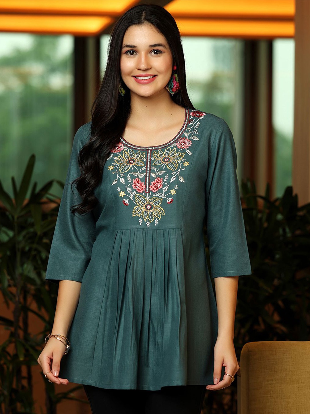 

Grey floral embroidered pleated kurti