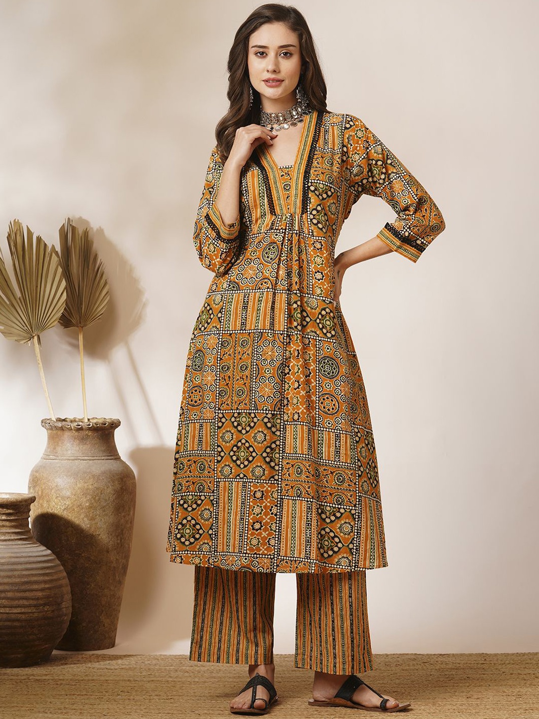 

FASHOR Ethnic Motifs Printed Pleated Pure Cotton A-Line Kurta With Palazzos, Mustard