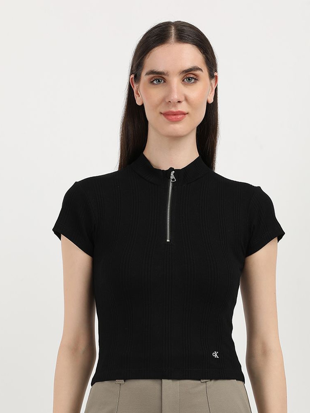 

Calvin Klein Jeans Women Solid Round Neck Cotton Top, Black